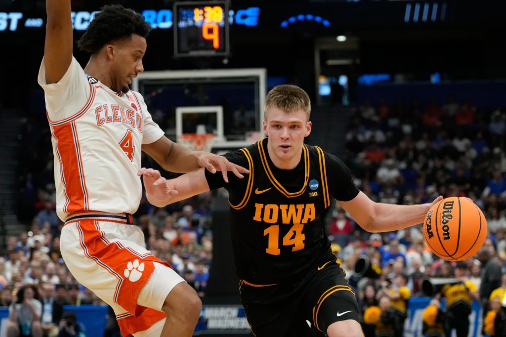 Stirtz weathers cold shooting to score 16 and help Iowa beat Clemson 67-61 in March&nbsp;Madness